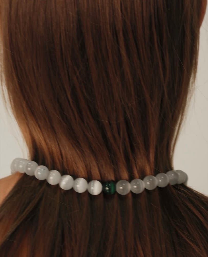 02 · Concentrated Energy. Onyx, silver.