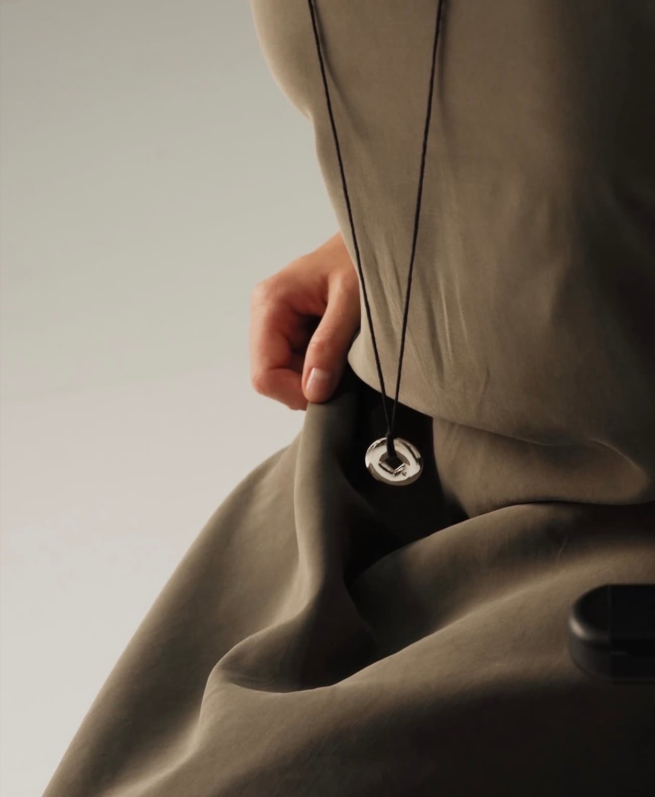 01 · This is where I came from. Silver, leather.